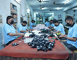 Employees work on the production line of wheel